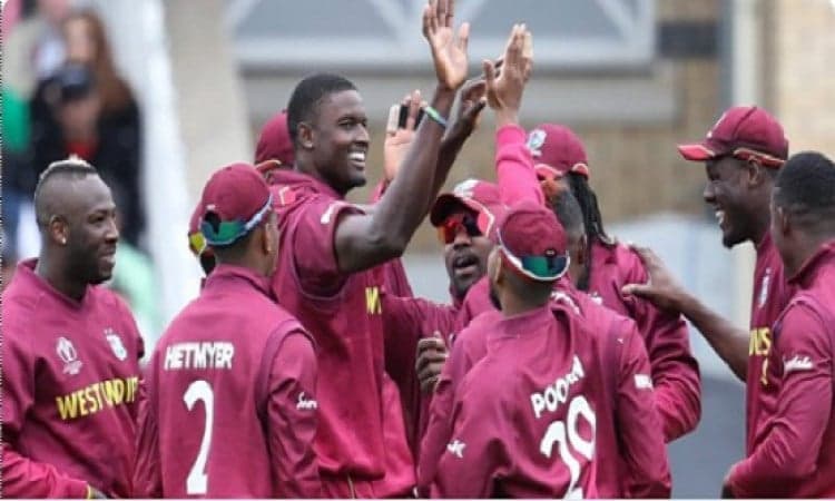 Jason Holder WIth Team