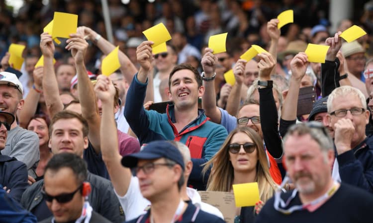 Spectators wave sandpapers at David Warner,Cameron Bancroft at Ashes Images
